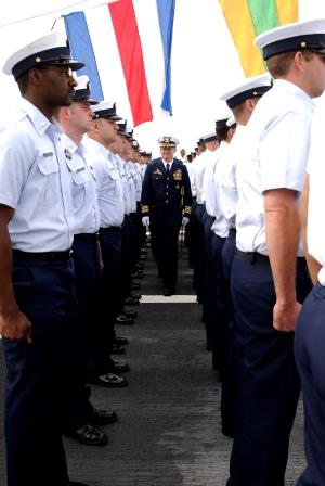 Many coast guards standing at attention
