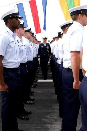 Many coast guards standing at attention