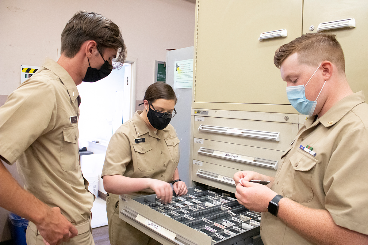 Cadets discussing Inventory Watch