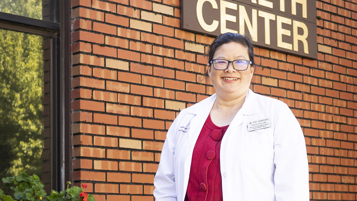 Dr. Grace Chou in front of Student Health Center