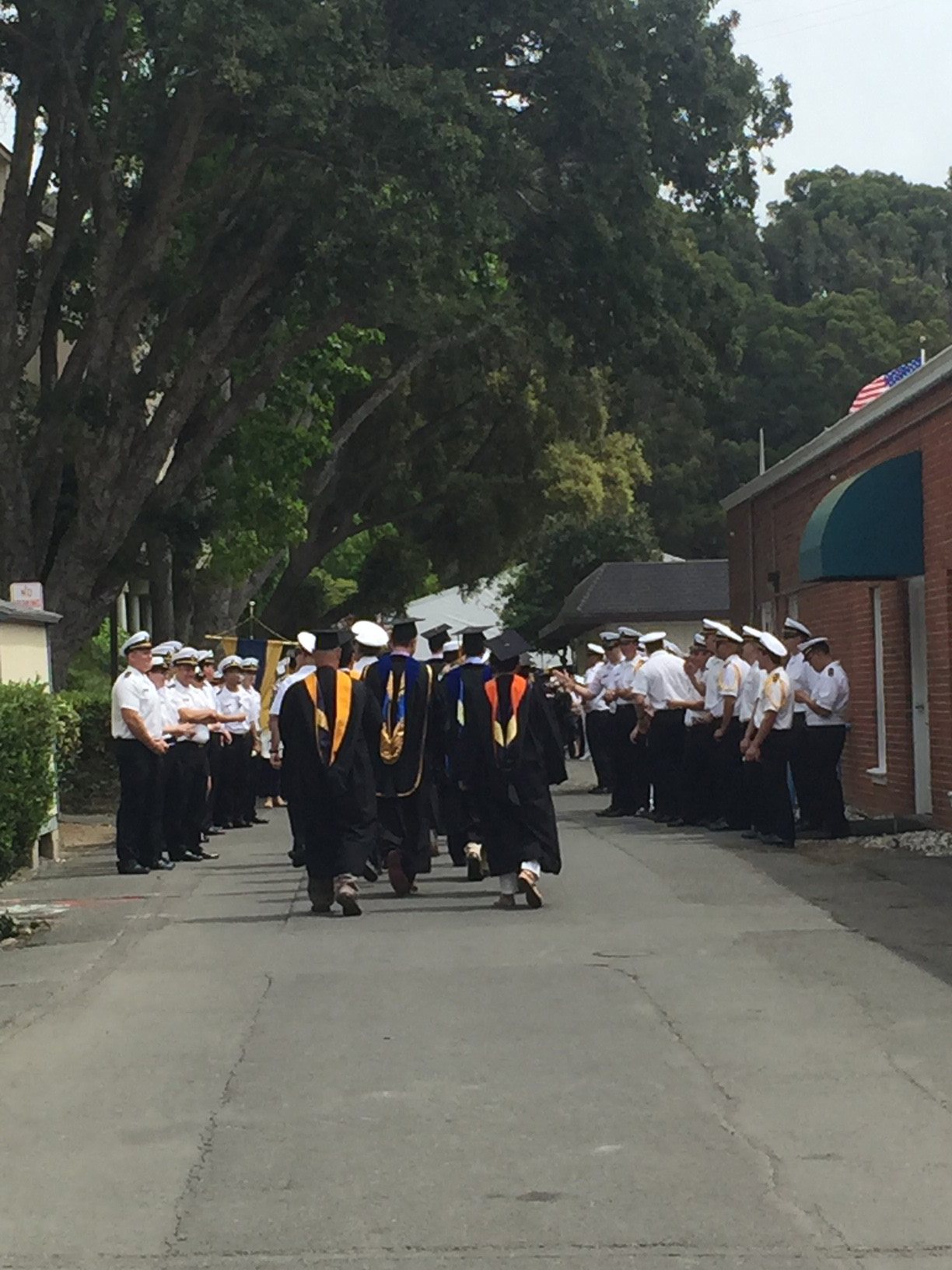 Graduating cadets walking down street