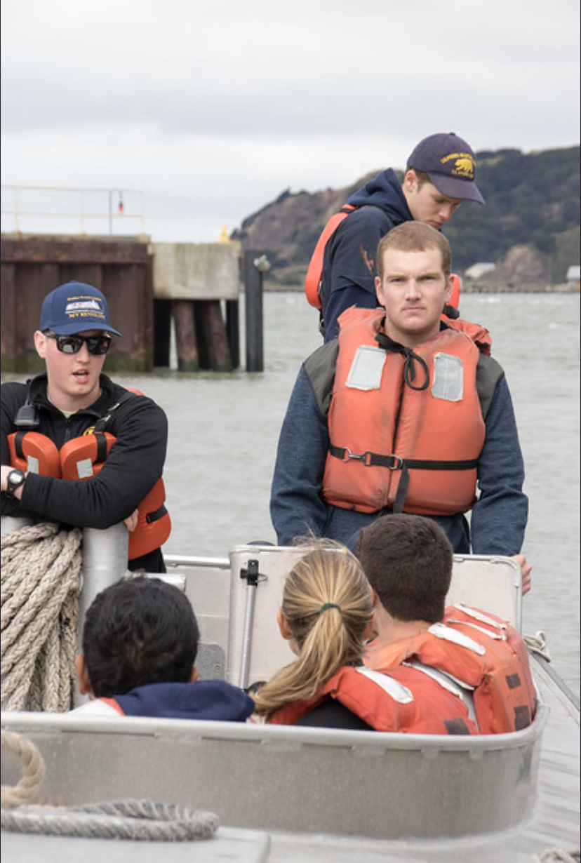 Cadets with life jackets in boat