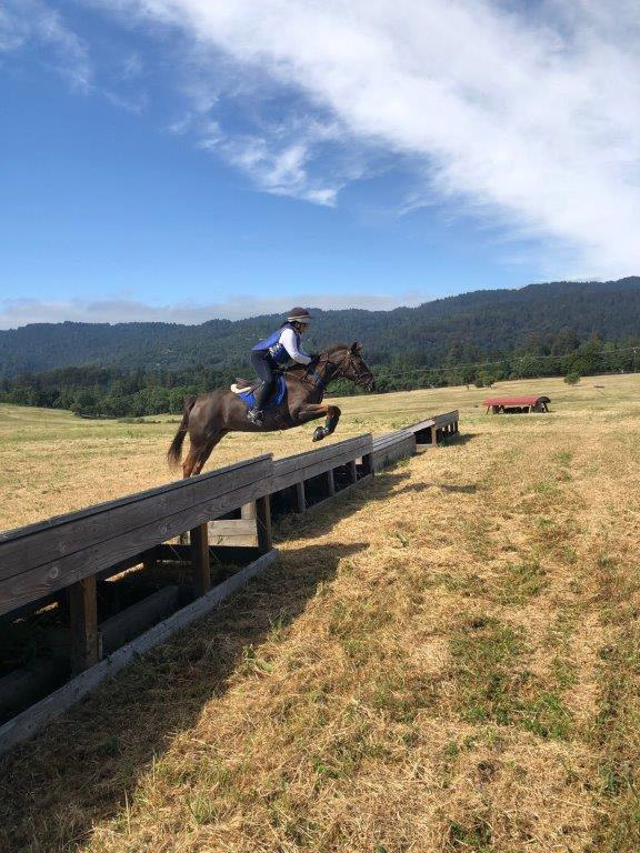 Dr. Grace Chou on horseback