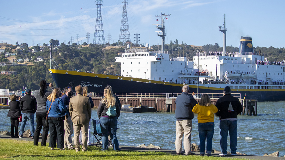 Families on shore while TSGB leaves