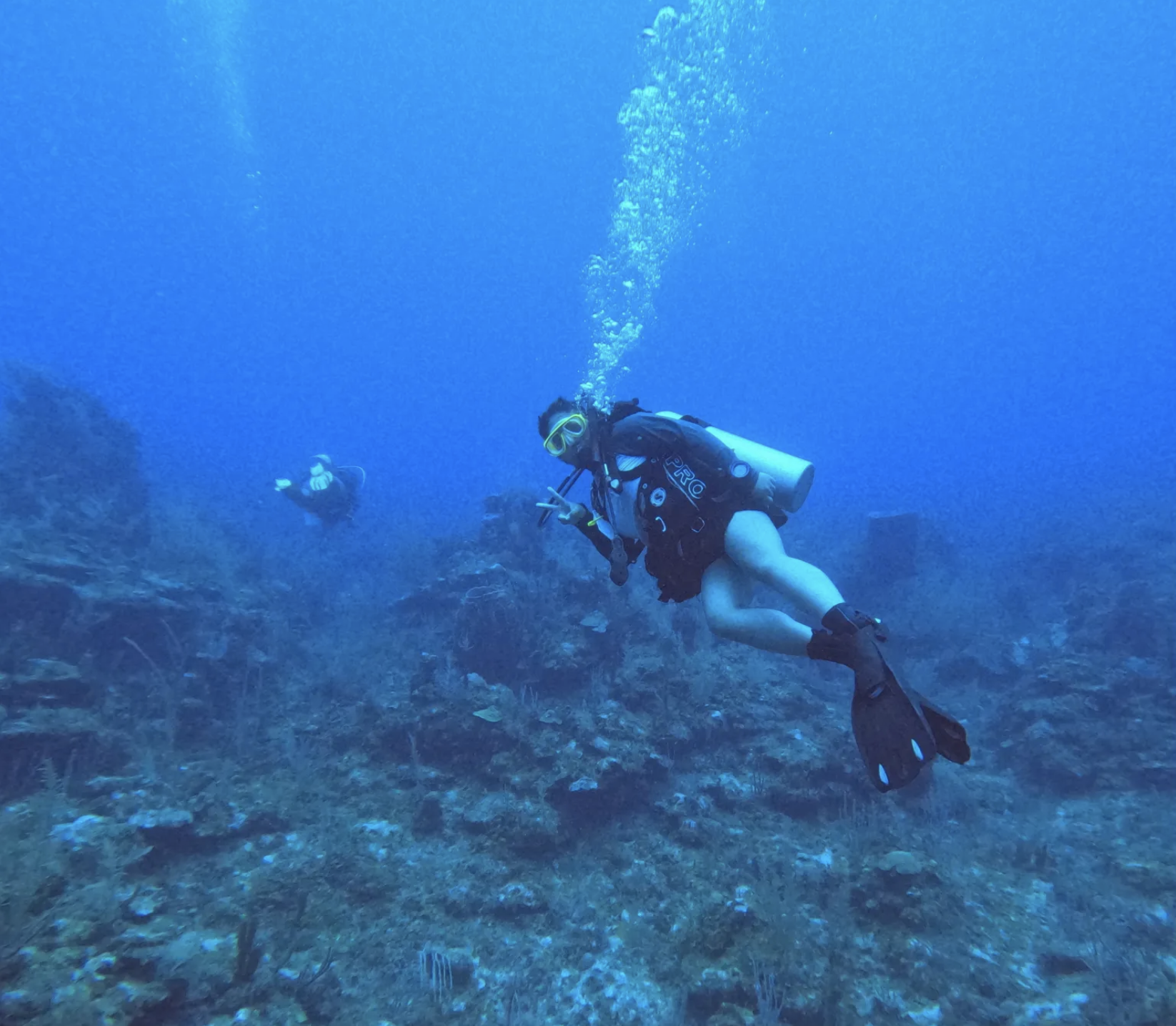 Cadet Roxanne Mina diving underwater in Honduras as part of the 2023 International Experience program.