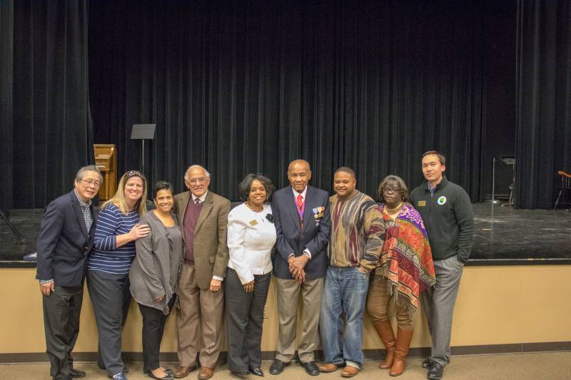  ilm Producer Sonny Izon, Unity Council members Josie Alexander and Ingrid Williams, General James Whitehead, Chair of the Black History Month Subcommittee Sharon Culpepper, Reverend Warren Fears, Unity Council Members Tyrone Wise, Demetra Miller, and council chair Ian Wallace