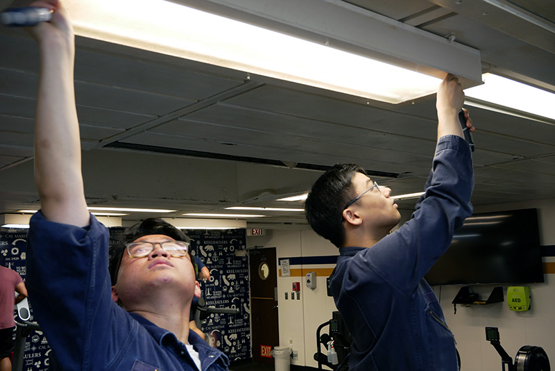 Cadets changing lightbulbs