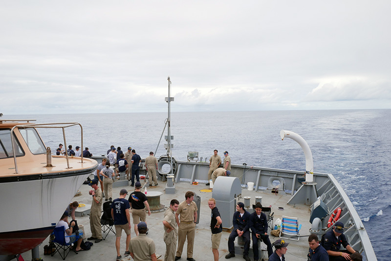 Cadets relaxing on fantail