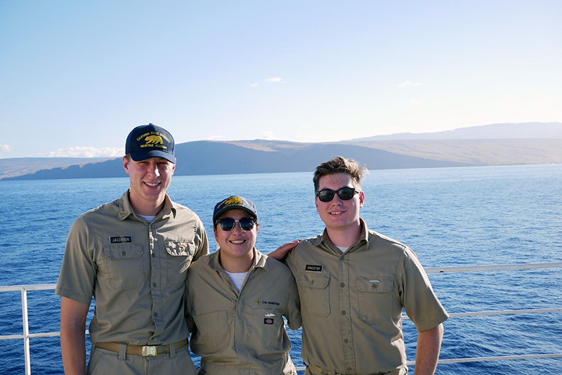 Three smiling cadets