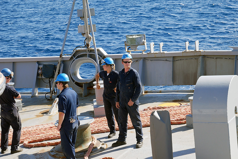 Deck cadets planning stowage of line