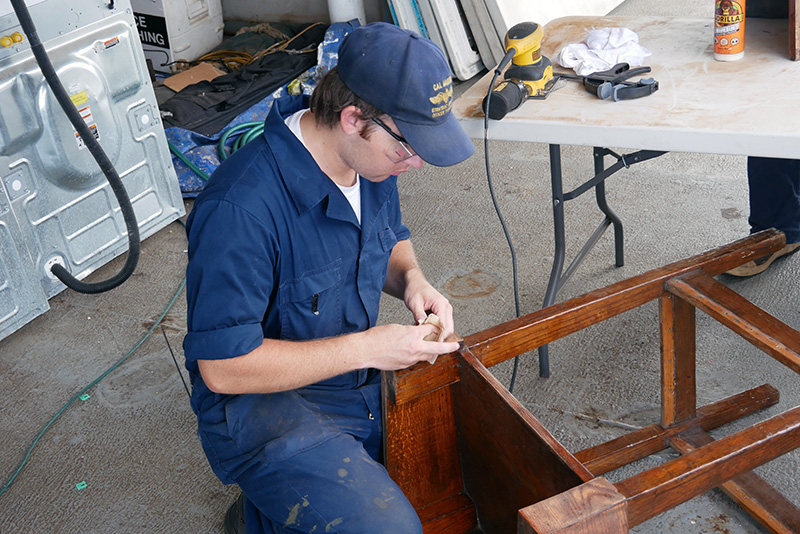 Cadet working on a wood table
