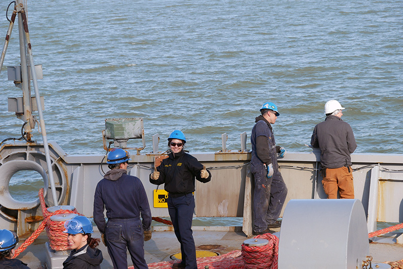Cadets smiling on ship