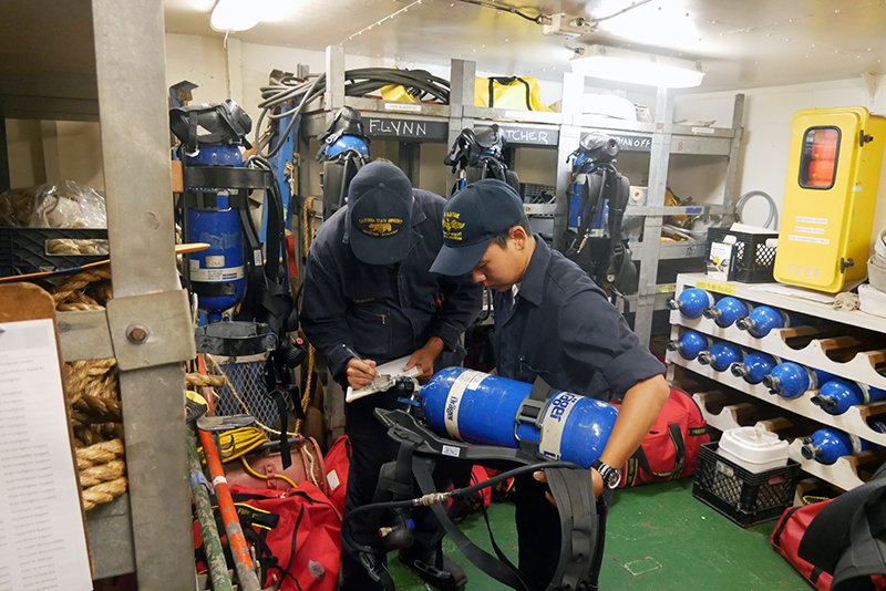 Cadets inspecting SCBA bottles