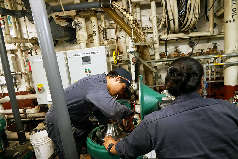 Cadets working in engine room