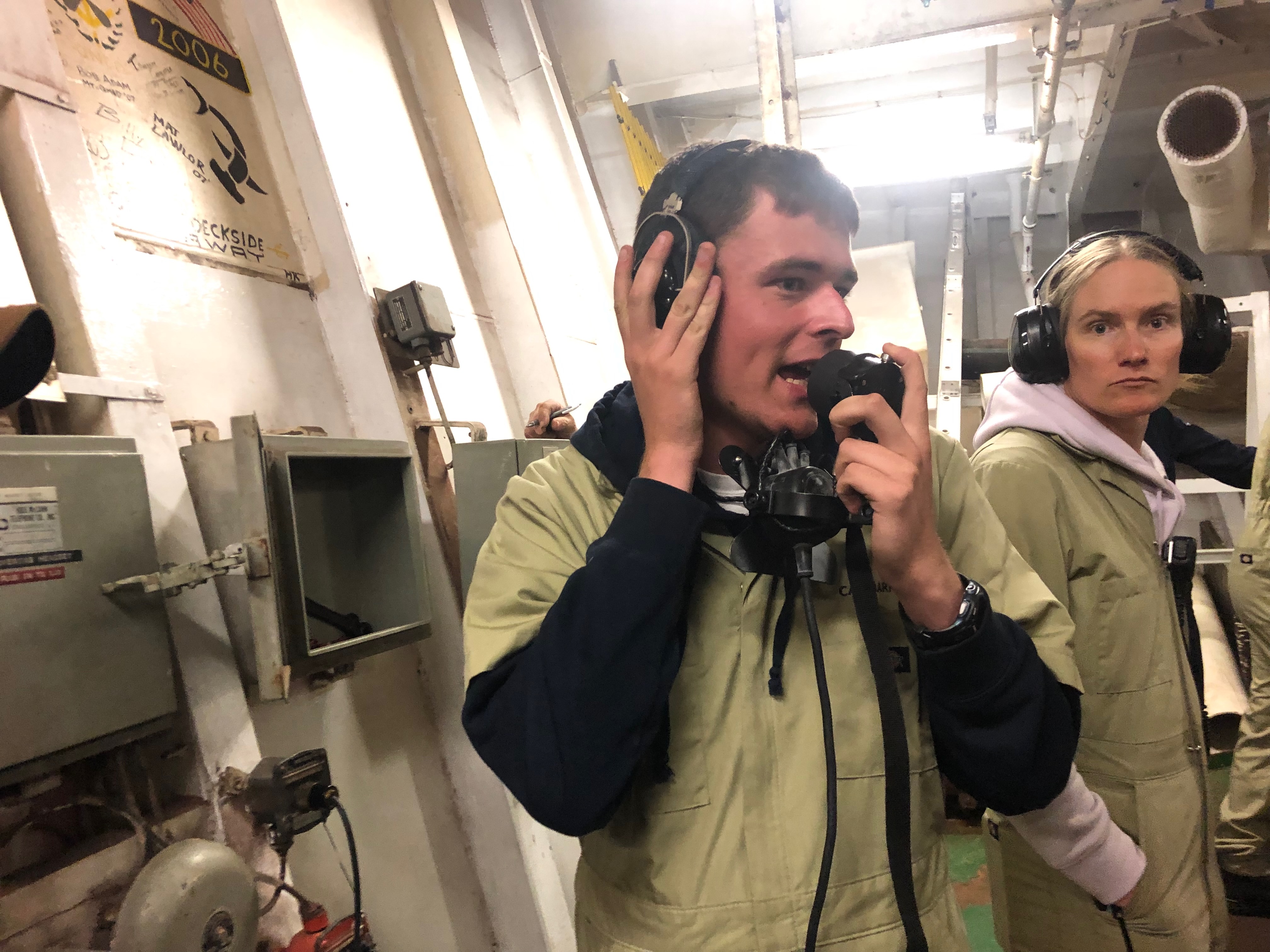 3C cadet Dan Golinski establishes communication with the bridge through the sound powered phone