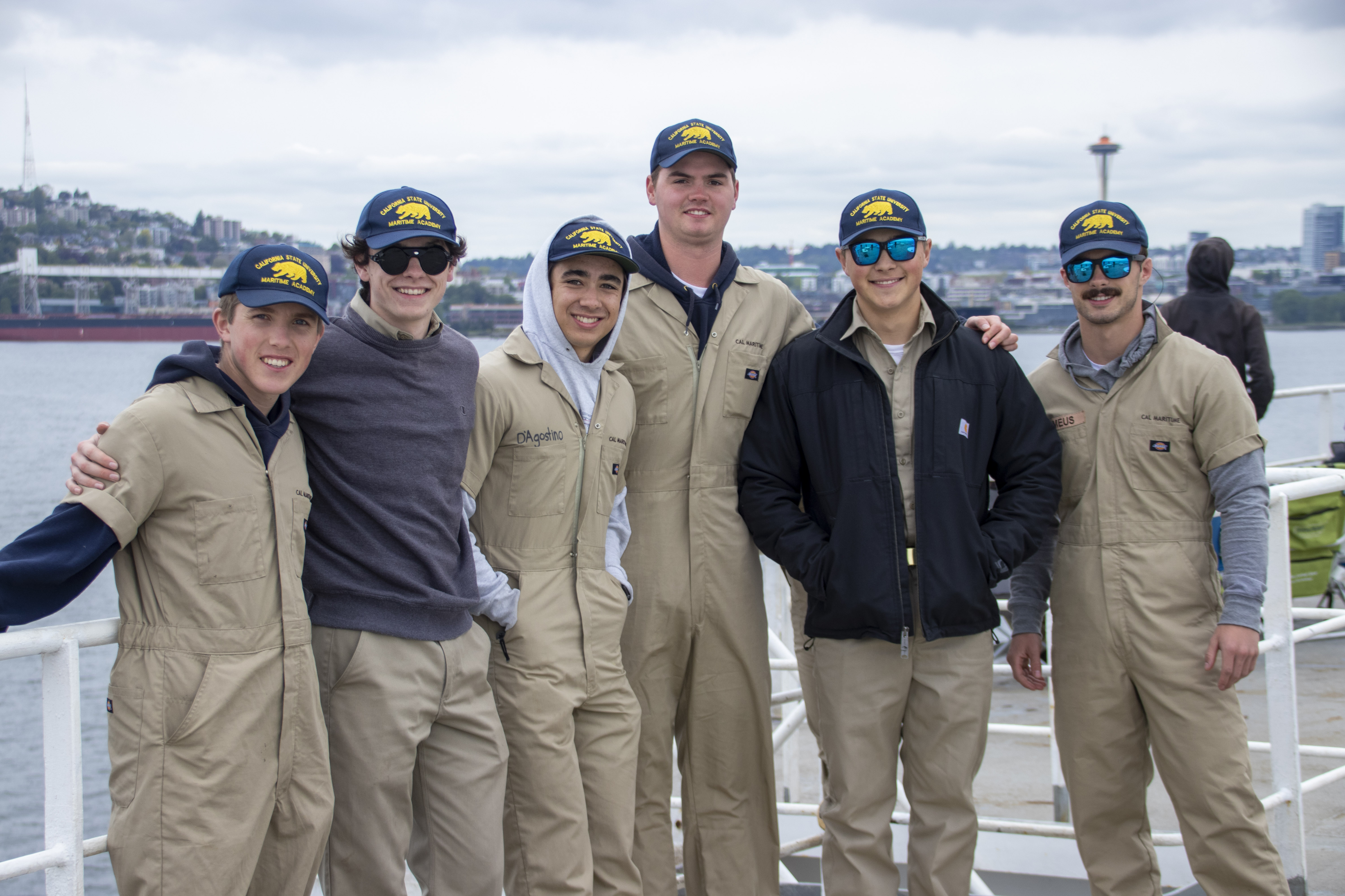Cadets smile for the camera with the Seattle skyline in the background. Photo credit- Sophie Scopazzi