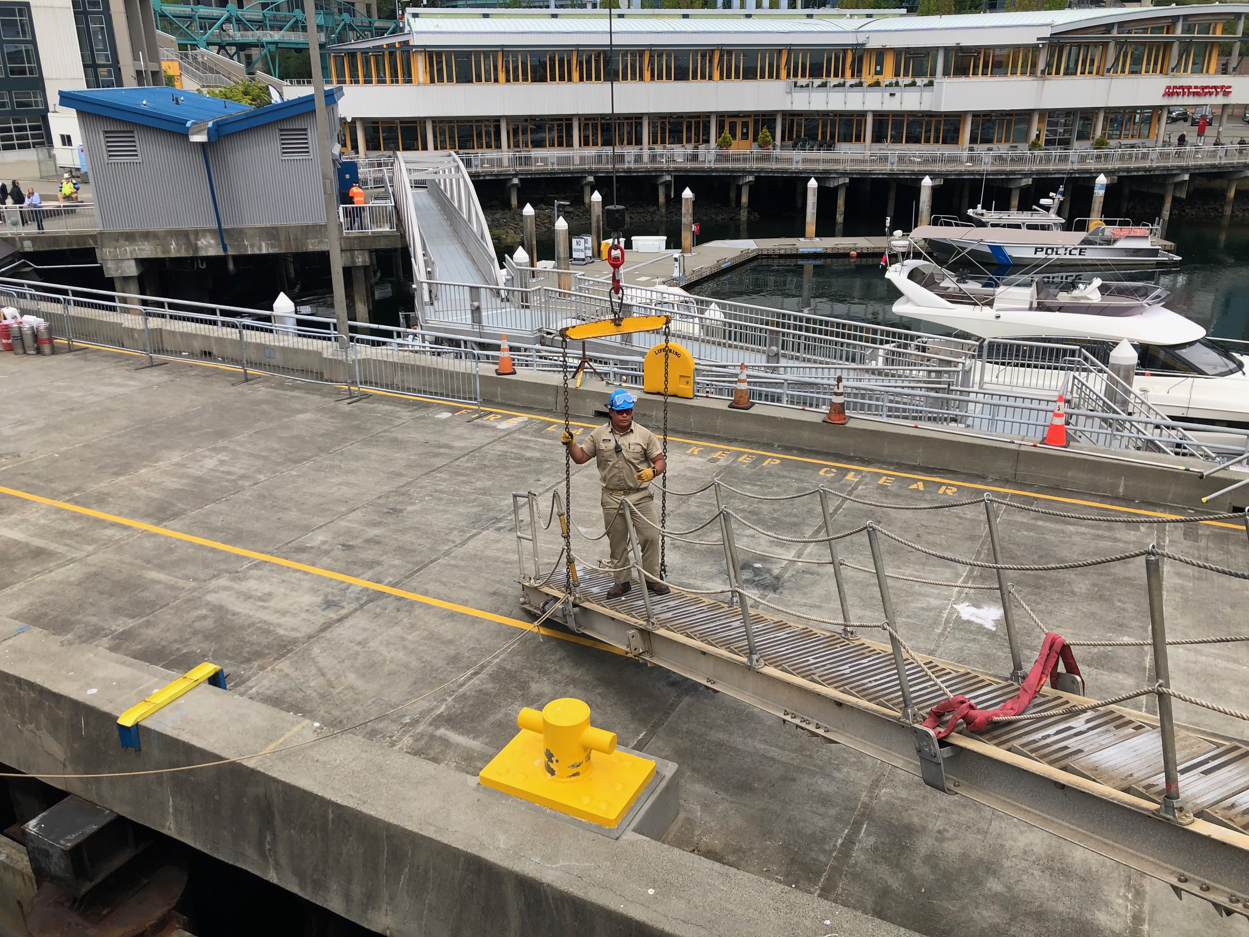 Cadet third mate Solomon Kaupu setting bridle and bale for the gangway