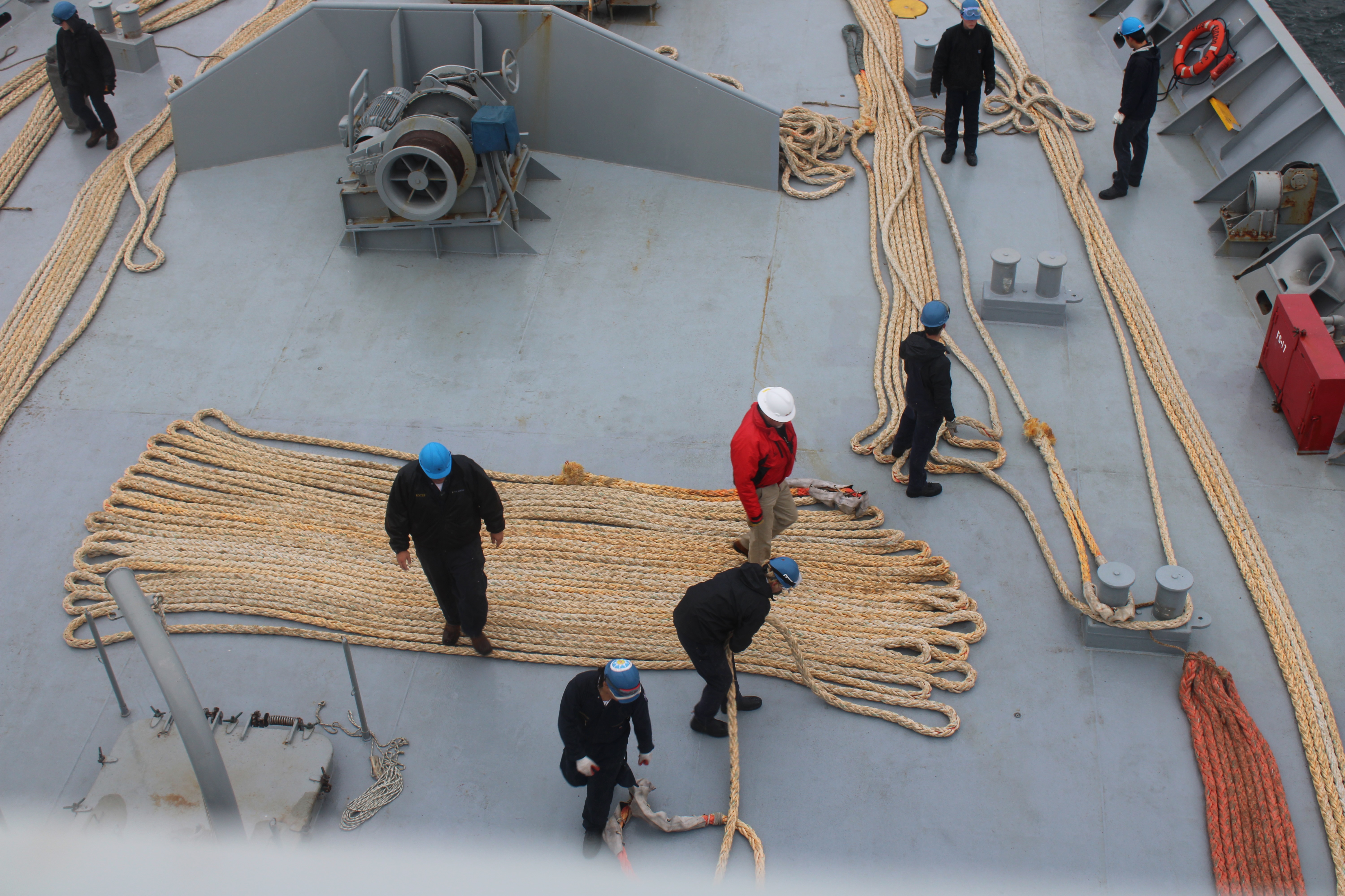 Cadets faking lines out on the foredeck