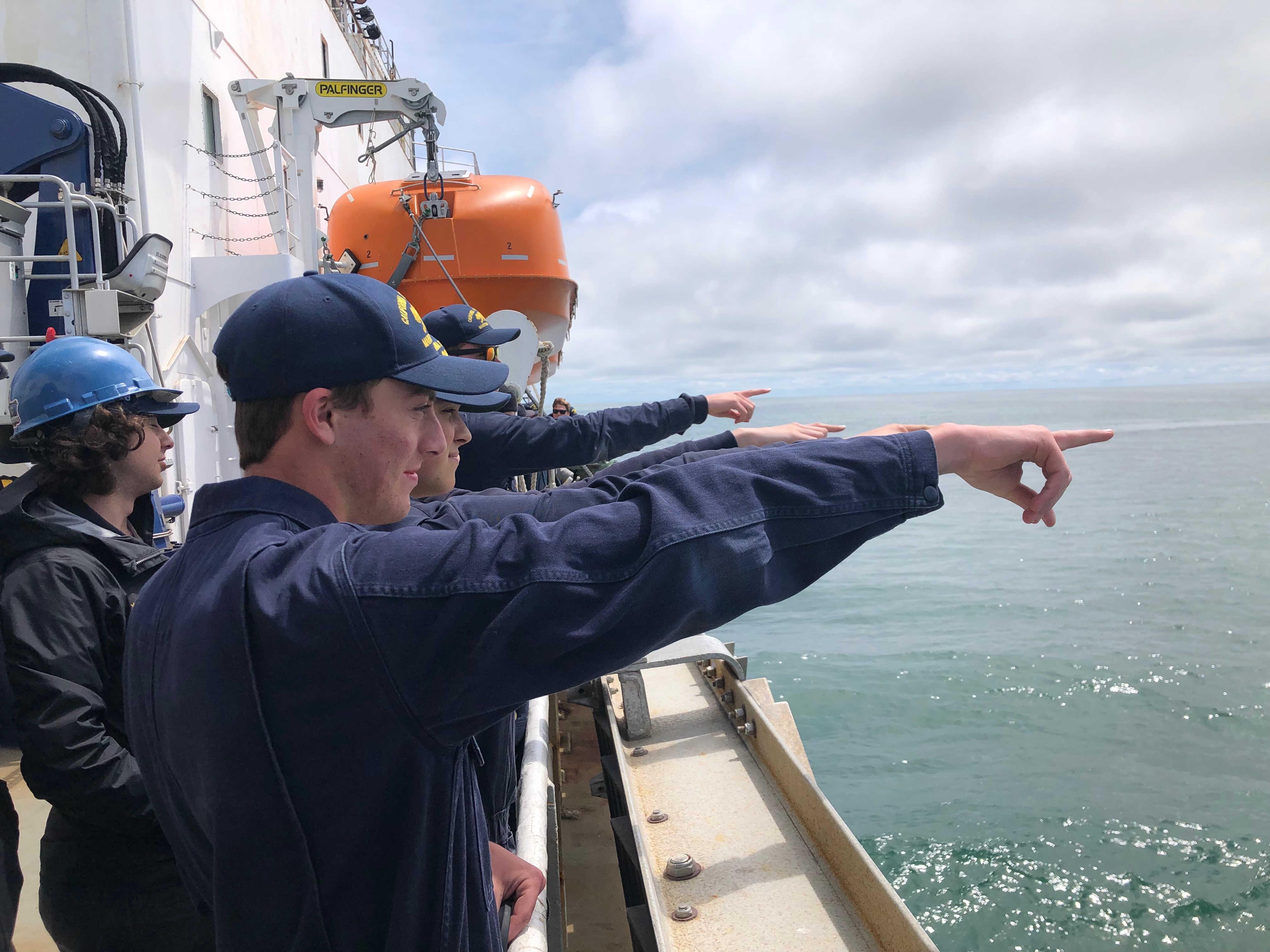 Cadets point to what they think is the melon, but it was actually a fishing buoy