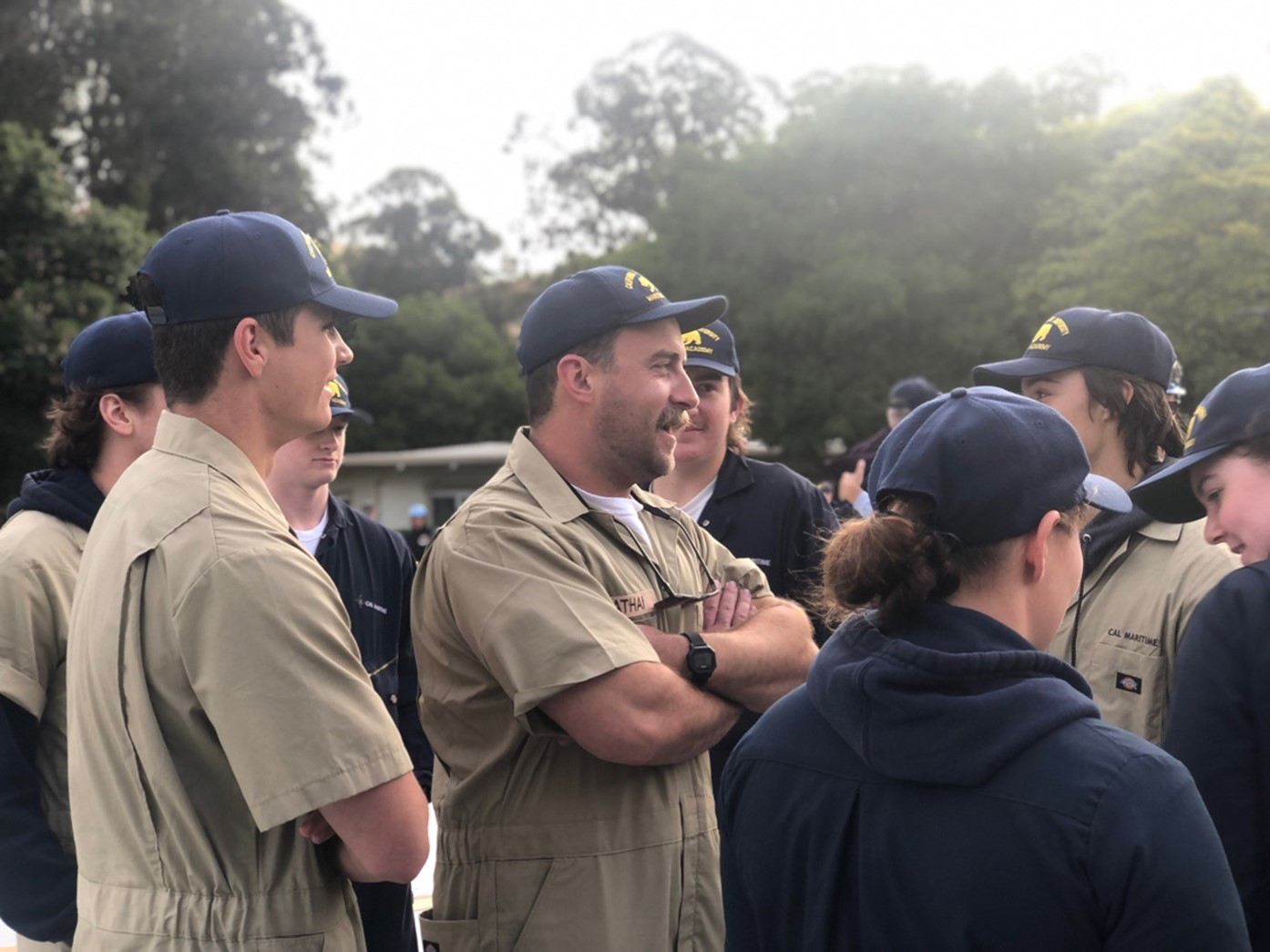 Everyone is gathering after formation to chat before heading to breakfast