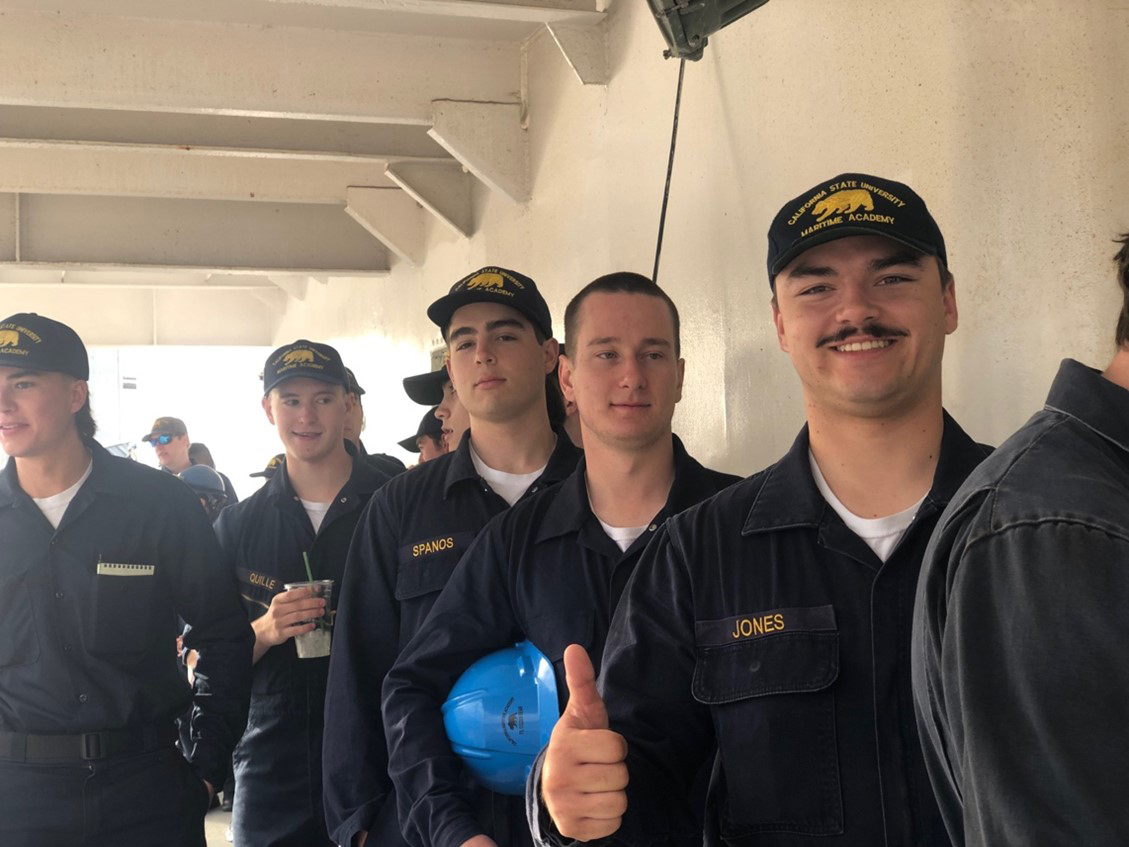 Max Jones the president of the Associated Students of Cal Maritime waits in line to be checked onto the ship