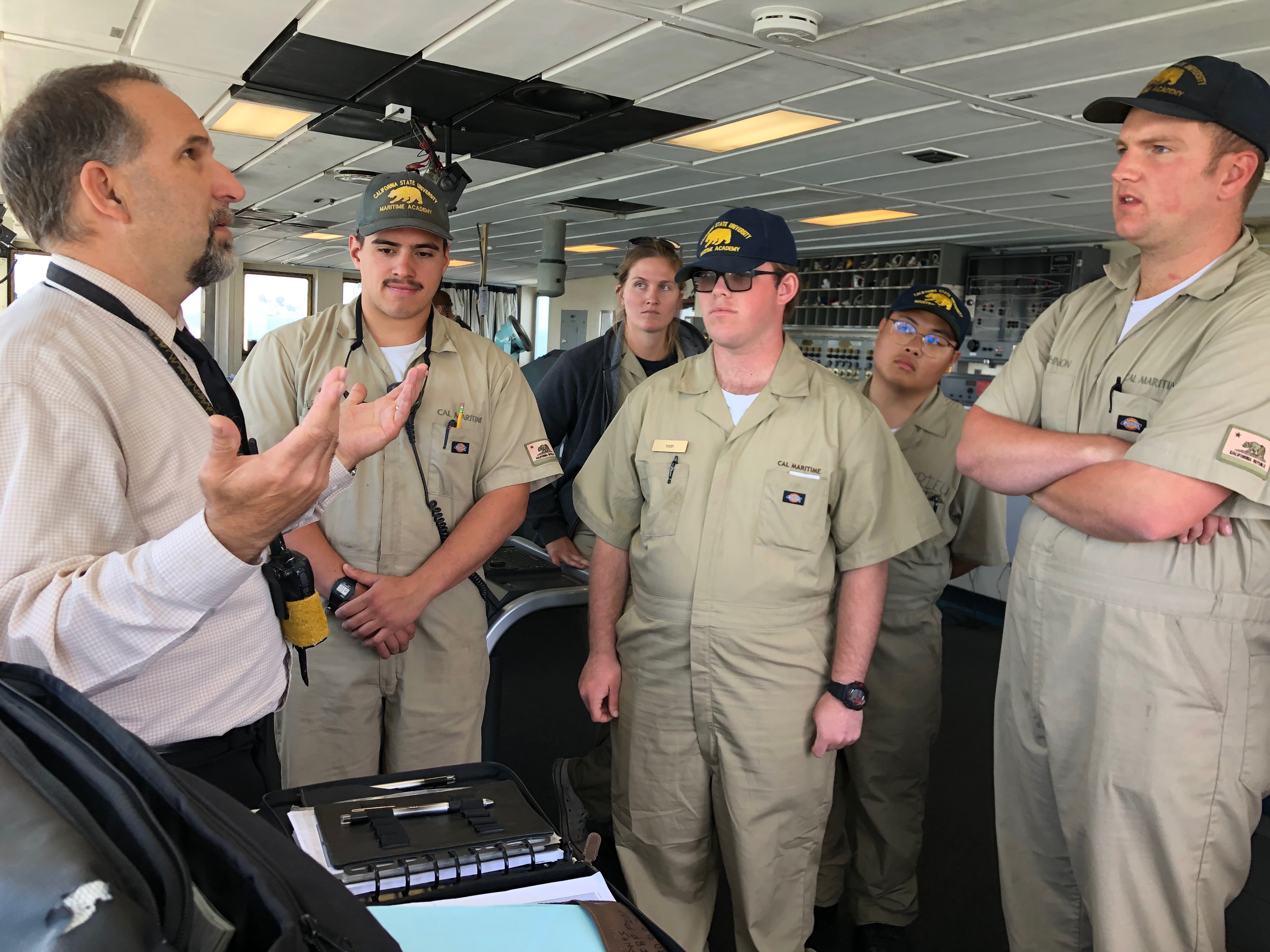 Pilot Mark enlightens a group of cadets
